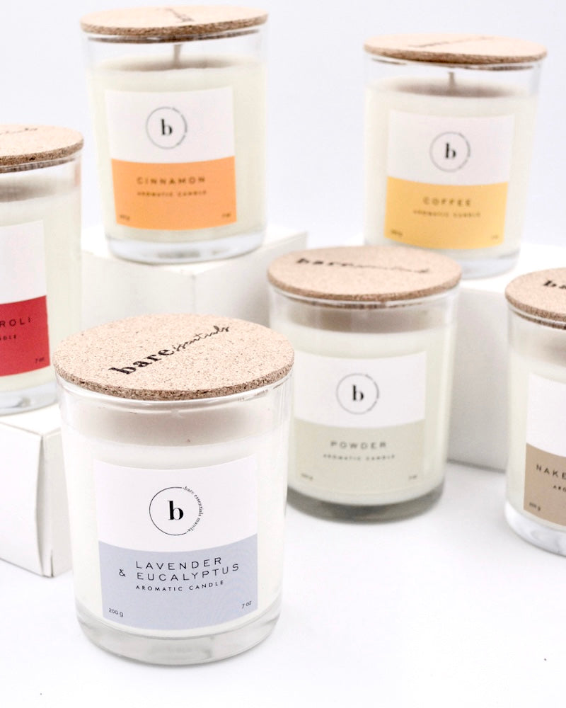 Collection of candles with labels on a white background